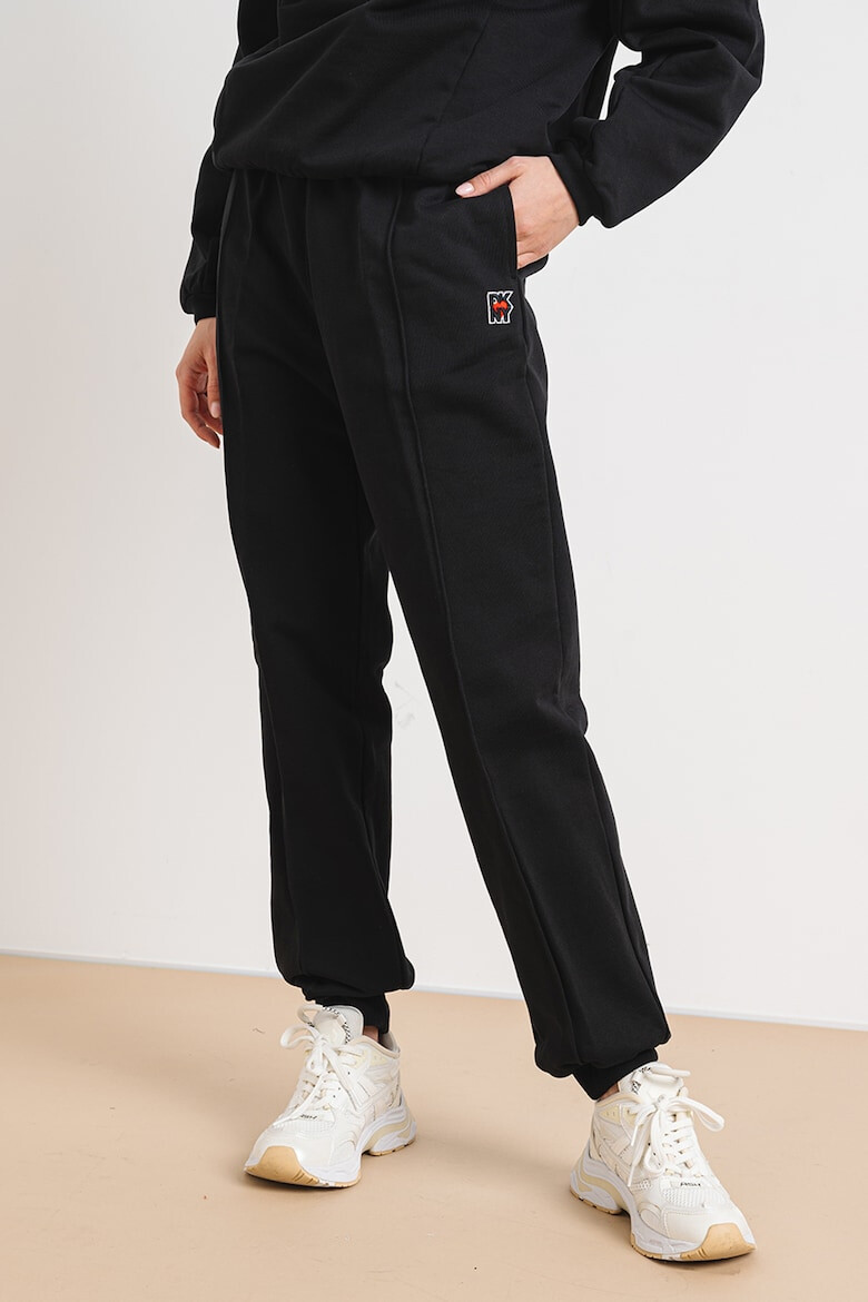 DKNY Pantaloni de trening uni de bumbac - Pled.ro