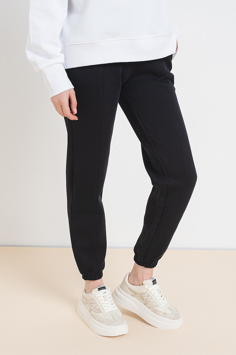 GUESS Pantaloni de trening din amestec de bumbac cu cusaturi frontale - Pled.ro