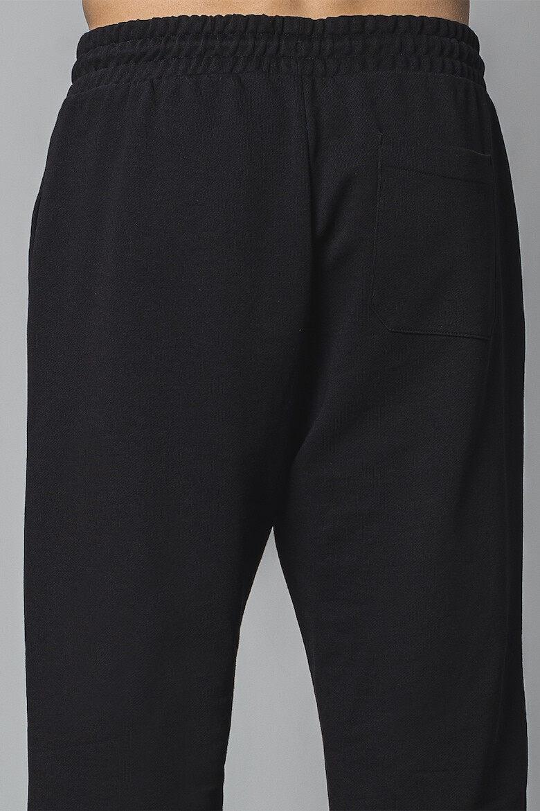 HUGO Pantaloni de trening relaxed fit cu snururi de ajustare - Pled.ro