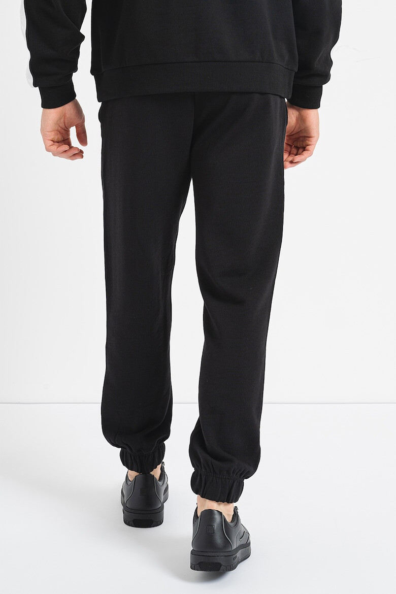 HUGO Pantaloni de trening relaxed fit Nuram - Pled.ro