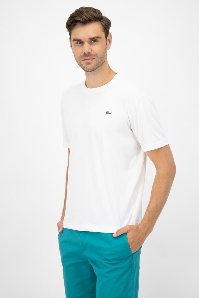 Lacoste Tricou cu decolteu la baza gatului si aplicatie logo discreta - Pled.ro