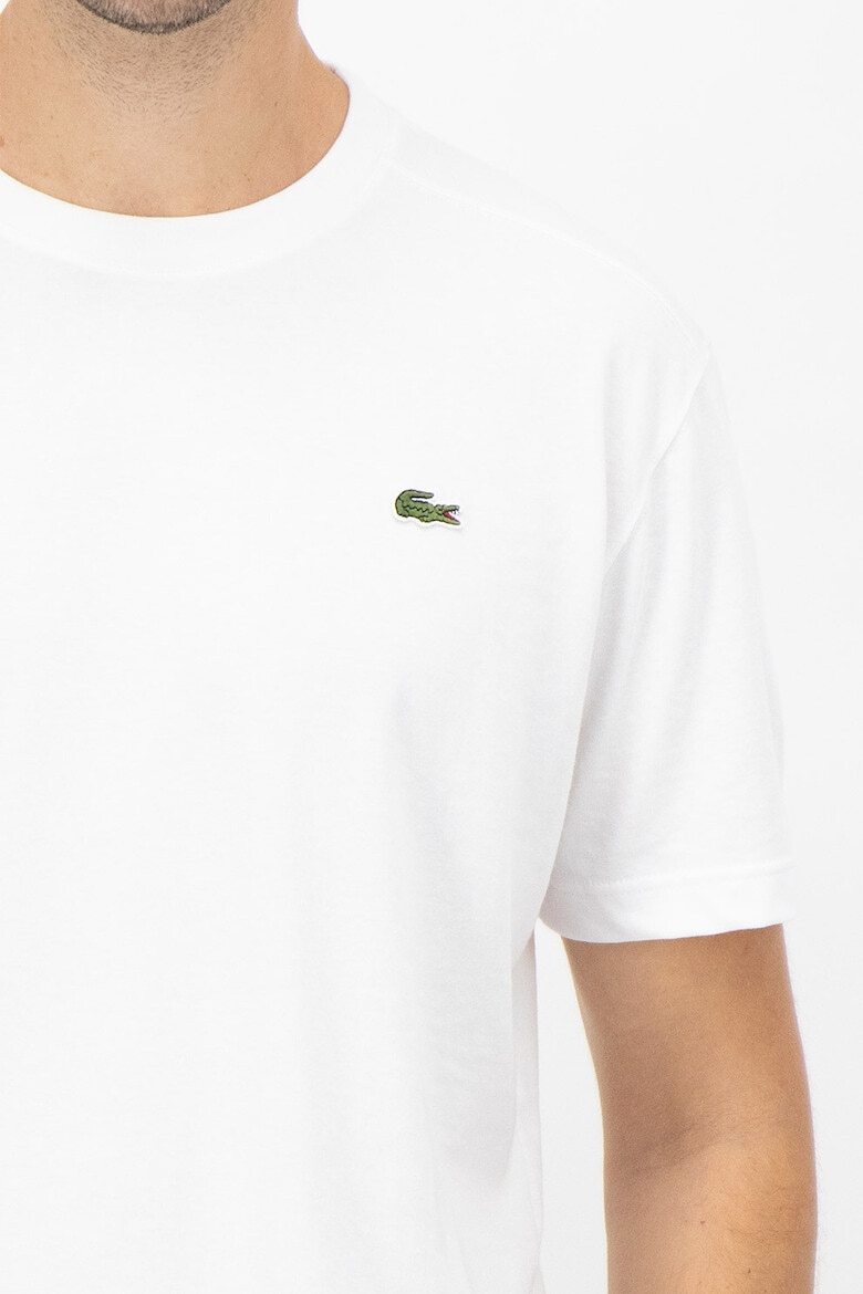 Lacoste Tricou cu decolteu la baza gatului si aplicatie logo discreta - Pled.ro