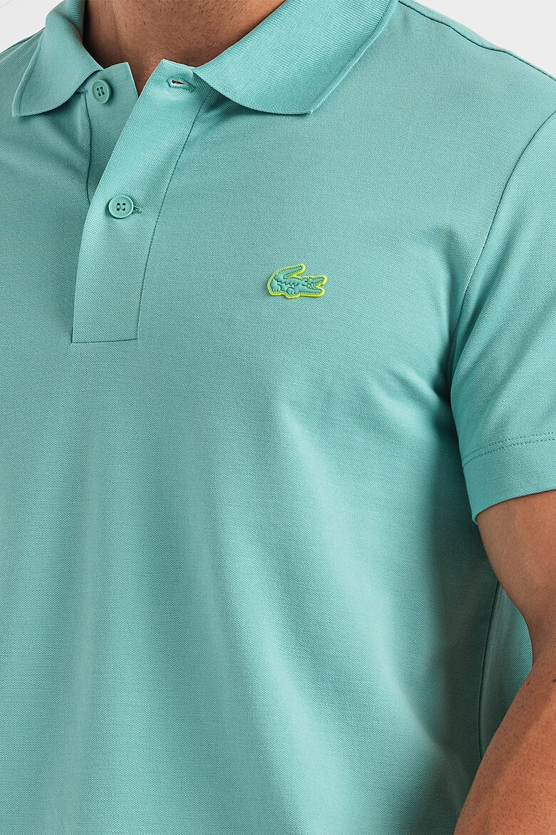 Lacoste Tricou polo din material pique cu imprimeu logo - Pled.ro