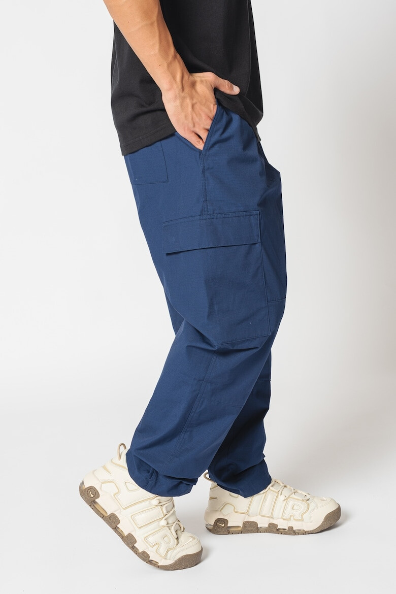 Nike Pantaloni cargo cu buzunare oblice Club - Pled.ro