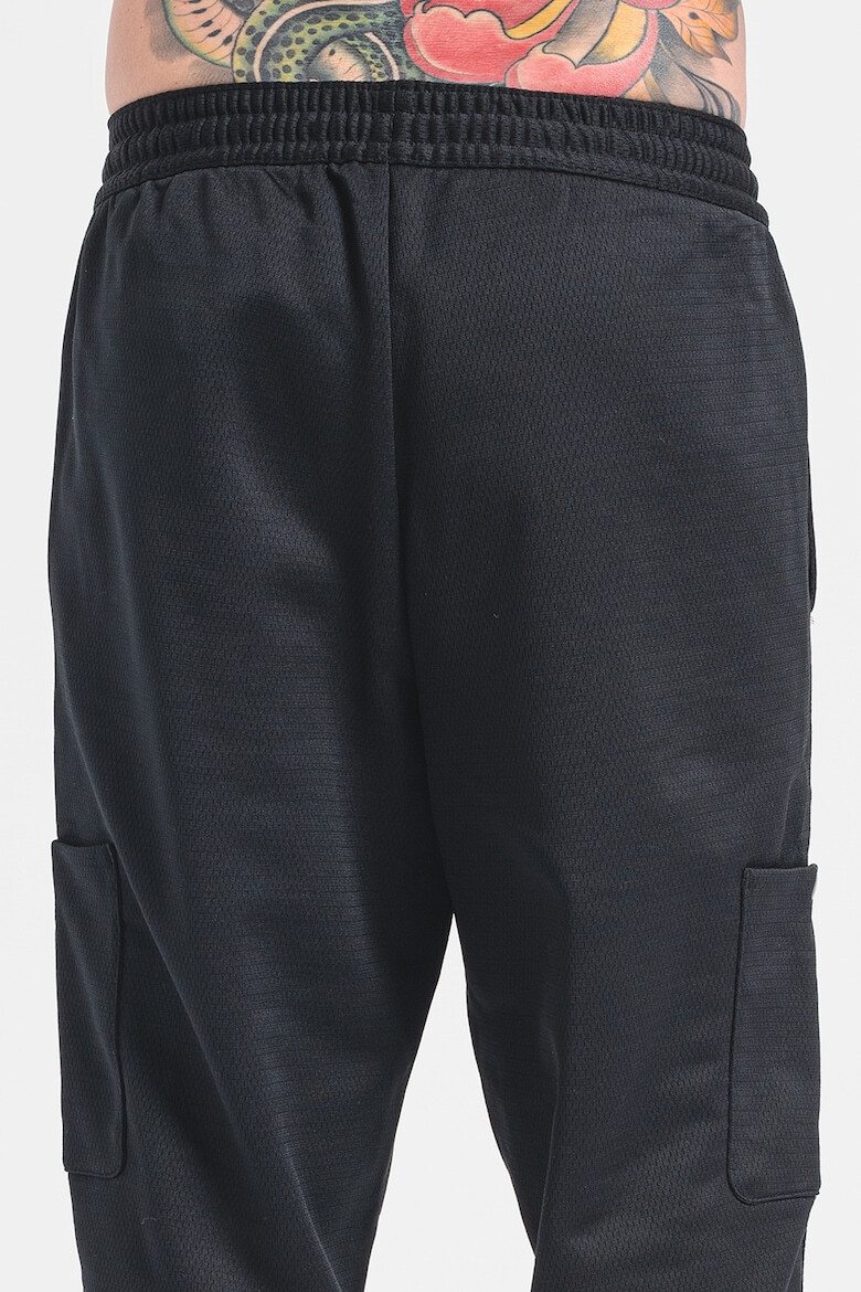 Nike Pantaloni cargo pentru baschet - Pled.ro