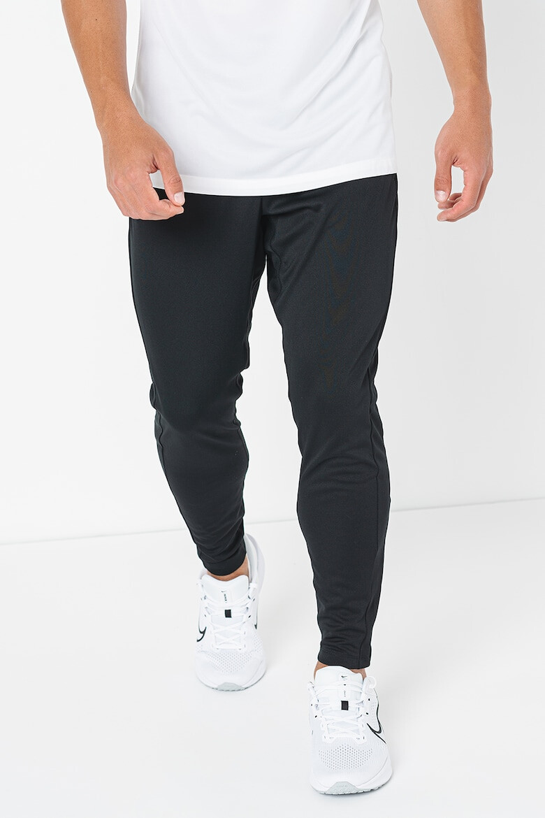 Nike Pantaloni conici cu buzunare laterale pentru fotbal - Pled.ro