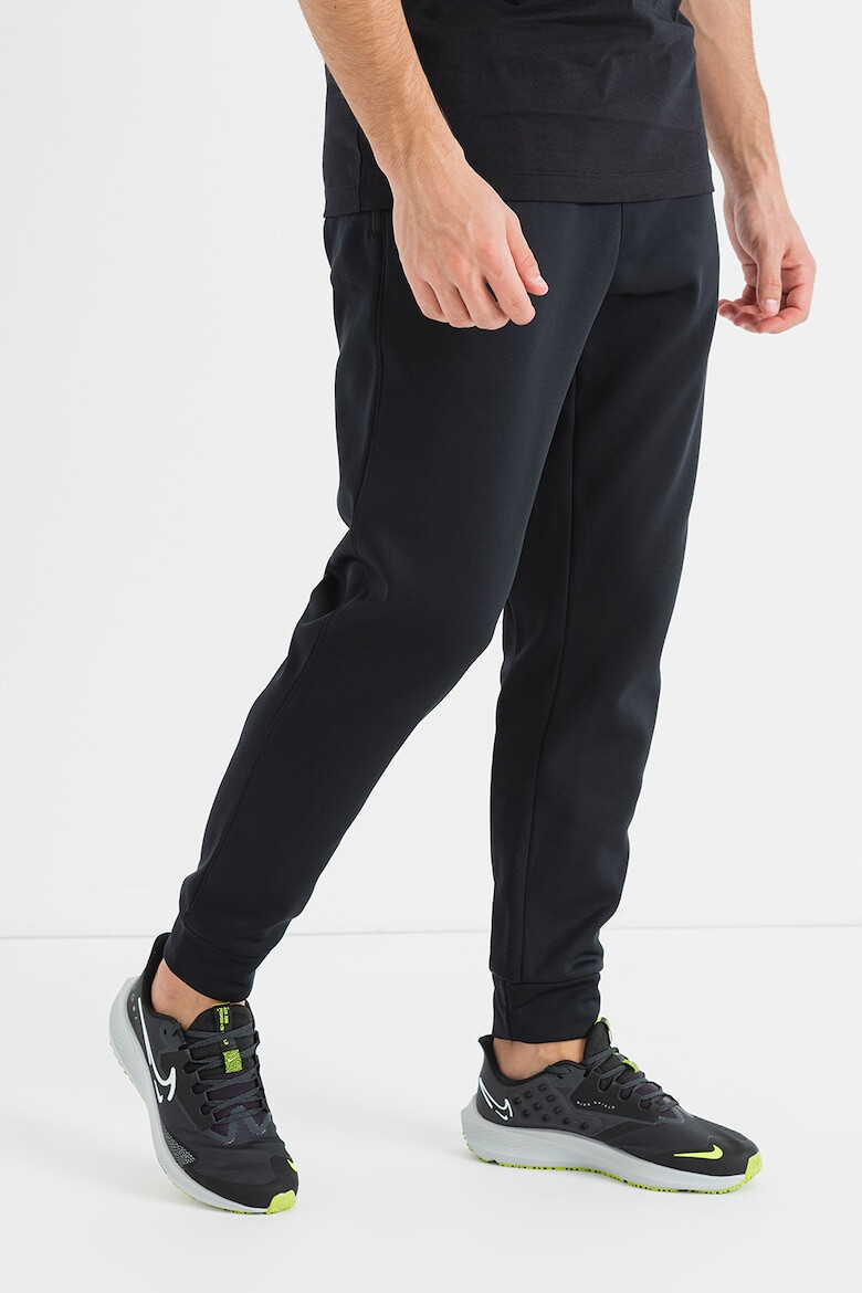 Nike Pantaloni conici cu logo pentru fitness - Pled.ro