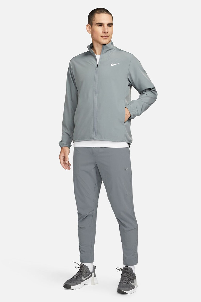 Nike Pantaloni conici cu tehnologie Dri-FIT si slituri cu fermoar Unlimited - Pled.ro