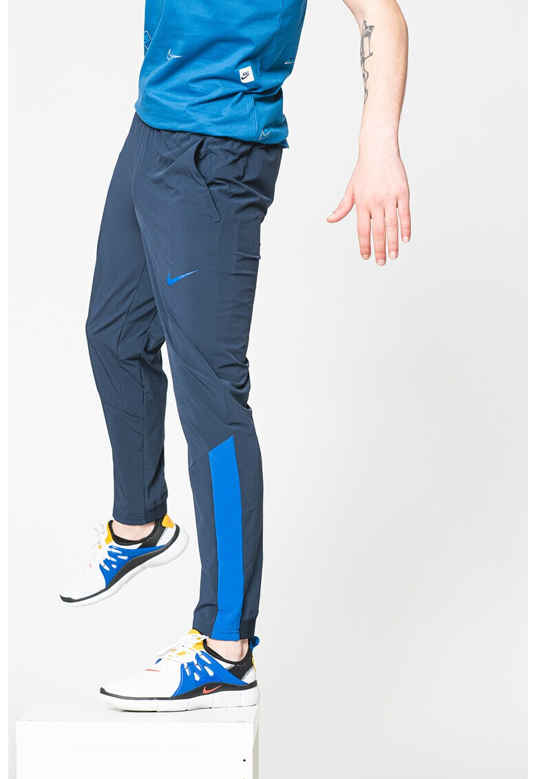 Nike Pantaloni cu buzunare laterale si tehnologie Dri-Fit pentru fitness Flex - Pled.ro