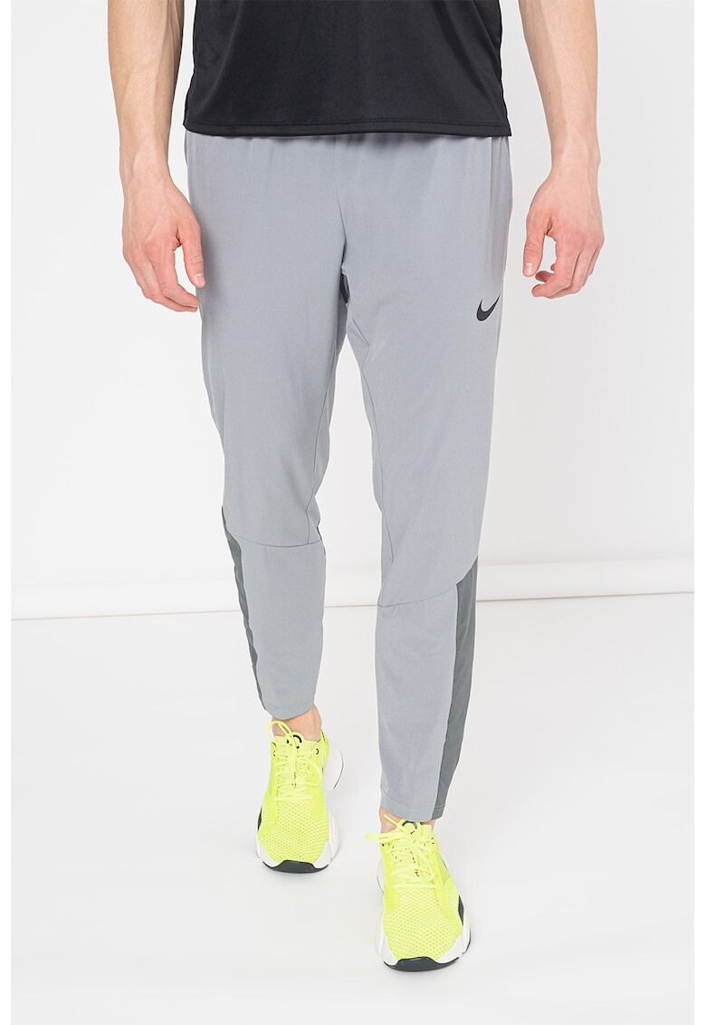 Nike Pantaloni cu buzunare laterale si tehnologie Dri-Fit pentru fitness Flex - Pled.ro