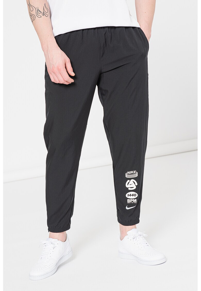 Nike Pantaloni cu imprimeu logo si tehnologie Dri-Fit pentru alergare Wild Challenger - Pled.ro