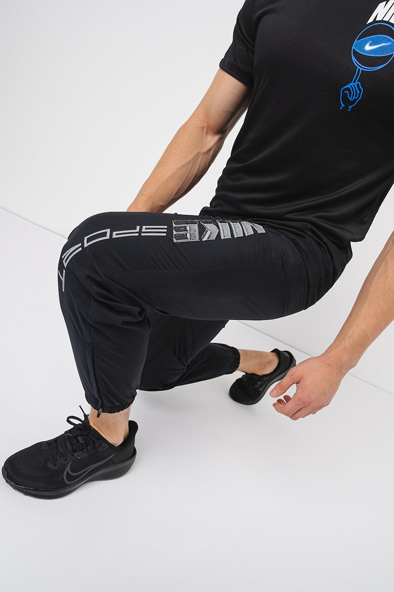 Nike Pantaloni cu tehnologie Dri-Fit imprimeu logo si buzunare oblice pentru fitness - Pled.ro