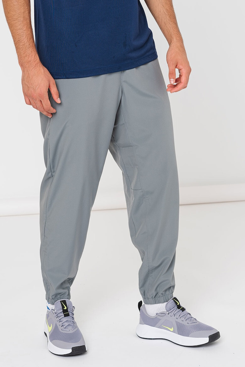 Nike Pantaloni cu tehnologie Dri-Fit pentru fitness - Pled.ro