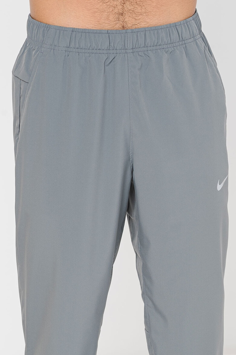 Nike Pantaloni cu tehnologie Dri-Fit pentru fitness - Pled.ro