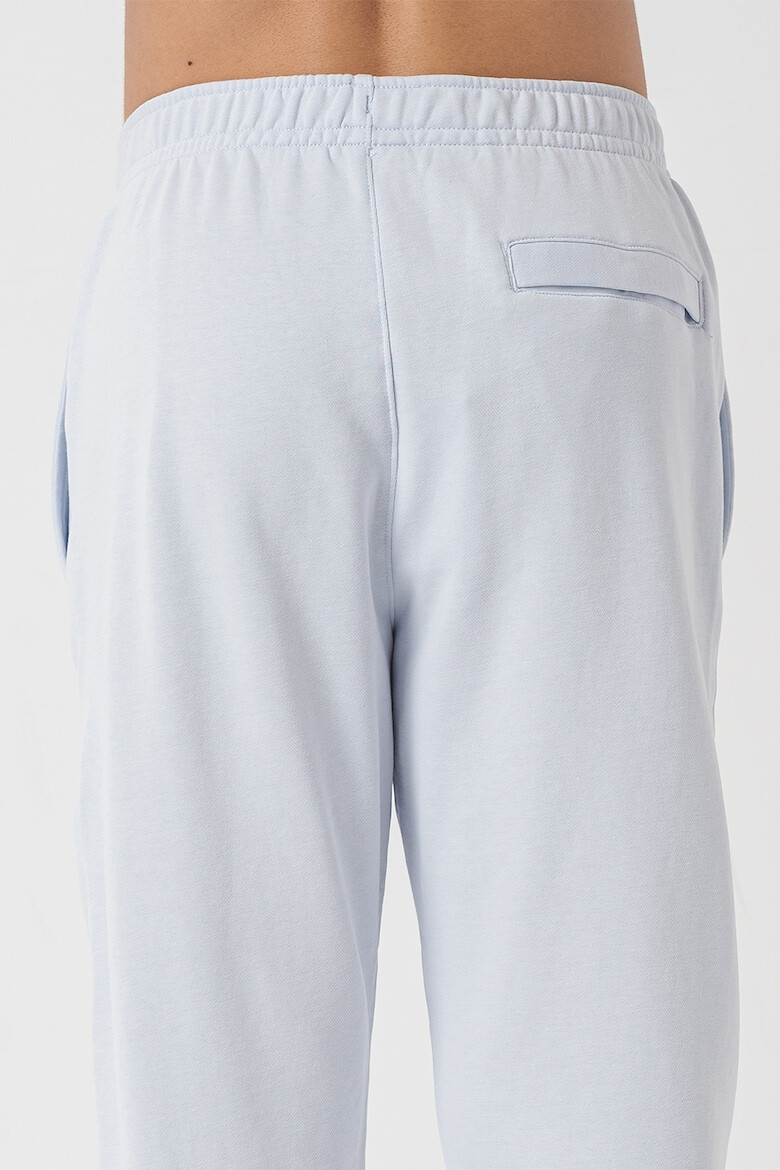 Nike Pantaloni de trening conici cu buzunare laterale Sportswear Club - Pled.ro