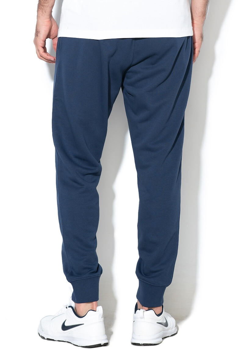 Nike Pantaloni de trening conici cu buzunare laterale Sportswear Club - Pled.ro