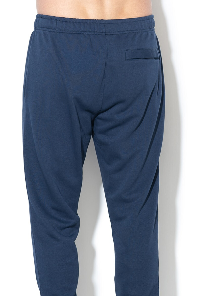 Nike Pantaloni de trening conici cu buzunare laterale Sportswear Club - Pled.ro