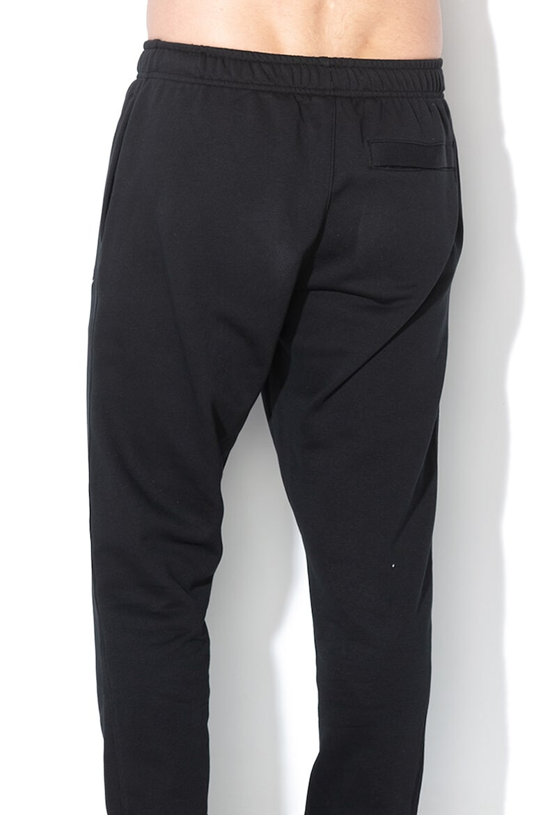 Nike Pantaloni de trening conici cu buzunare laterale Sportswear Club - Pled.ro