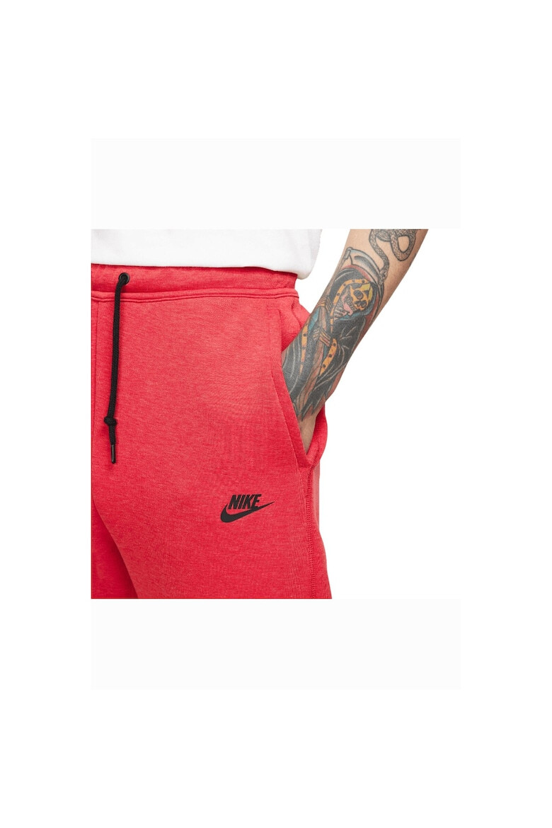 Nike Pantaloni de trening cu buzunare cu fermoar - Pled.ro