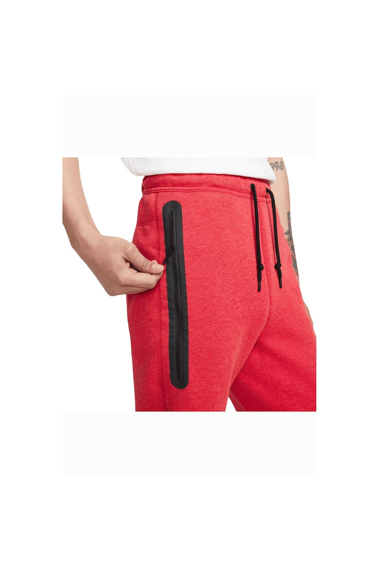 Nike Pantaloni de trening cu buzunare cu fermoar - Pled.ro