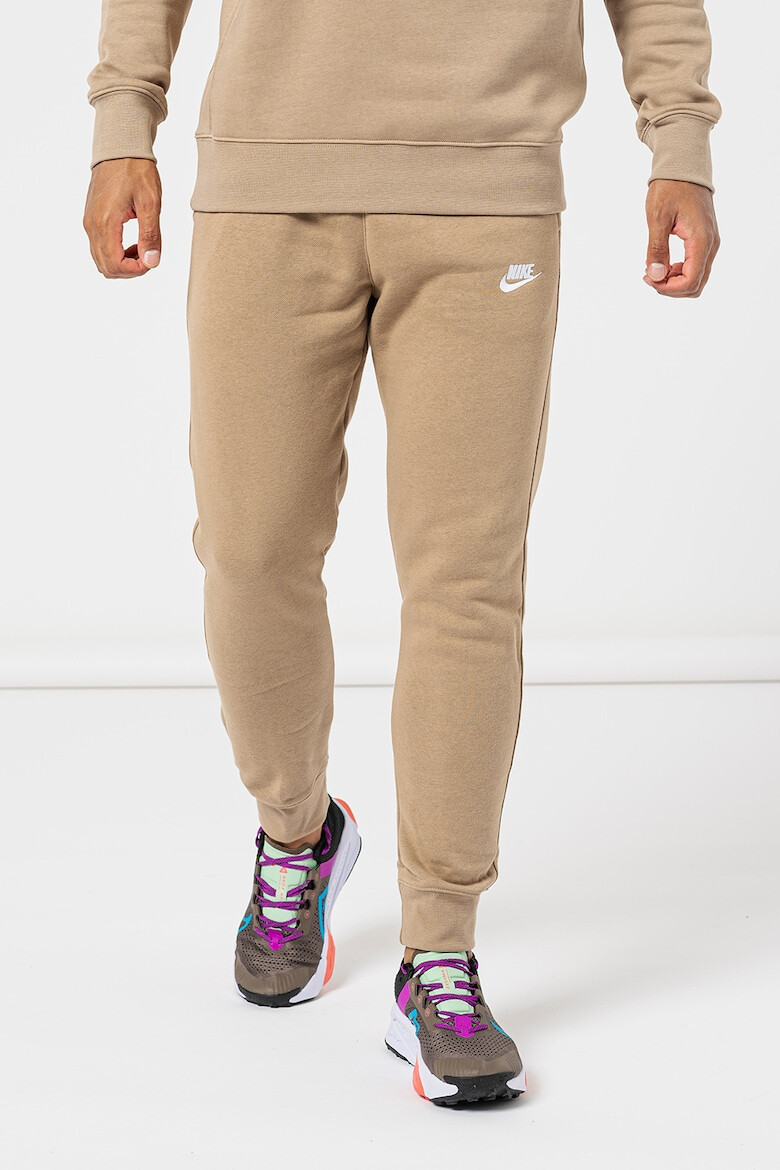 Nike Pantaloni de trening cu buzunare laterale - Pled.ro