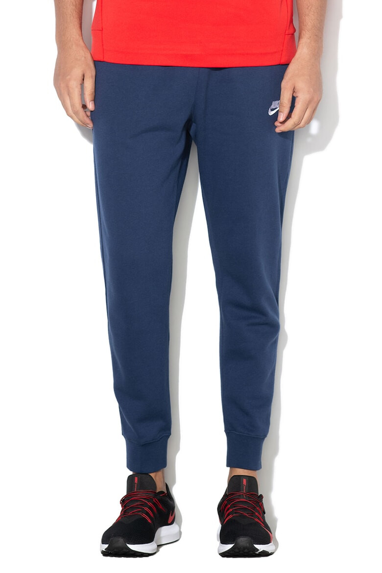 Nike Pantaloni de trening cu buzunare laterale - Pled.ro