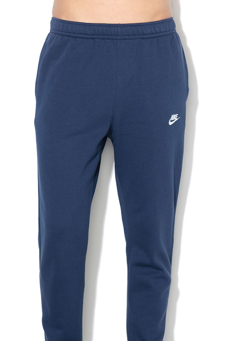 Nike Pantaloni de trening cu buzunare laterale - Pled.ro