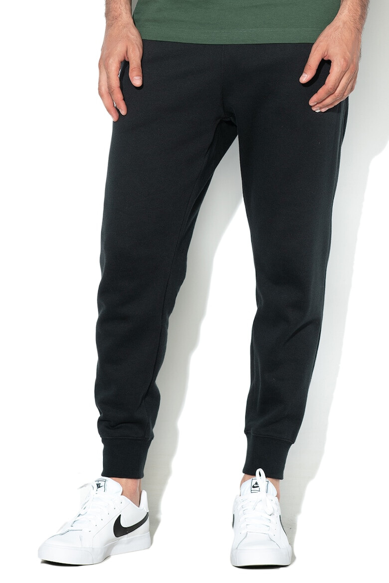 Nike Pantaloni de trening cu buzunare laterale - Pled.ro