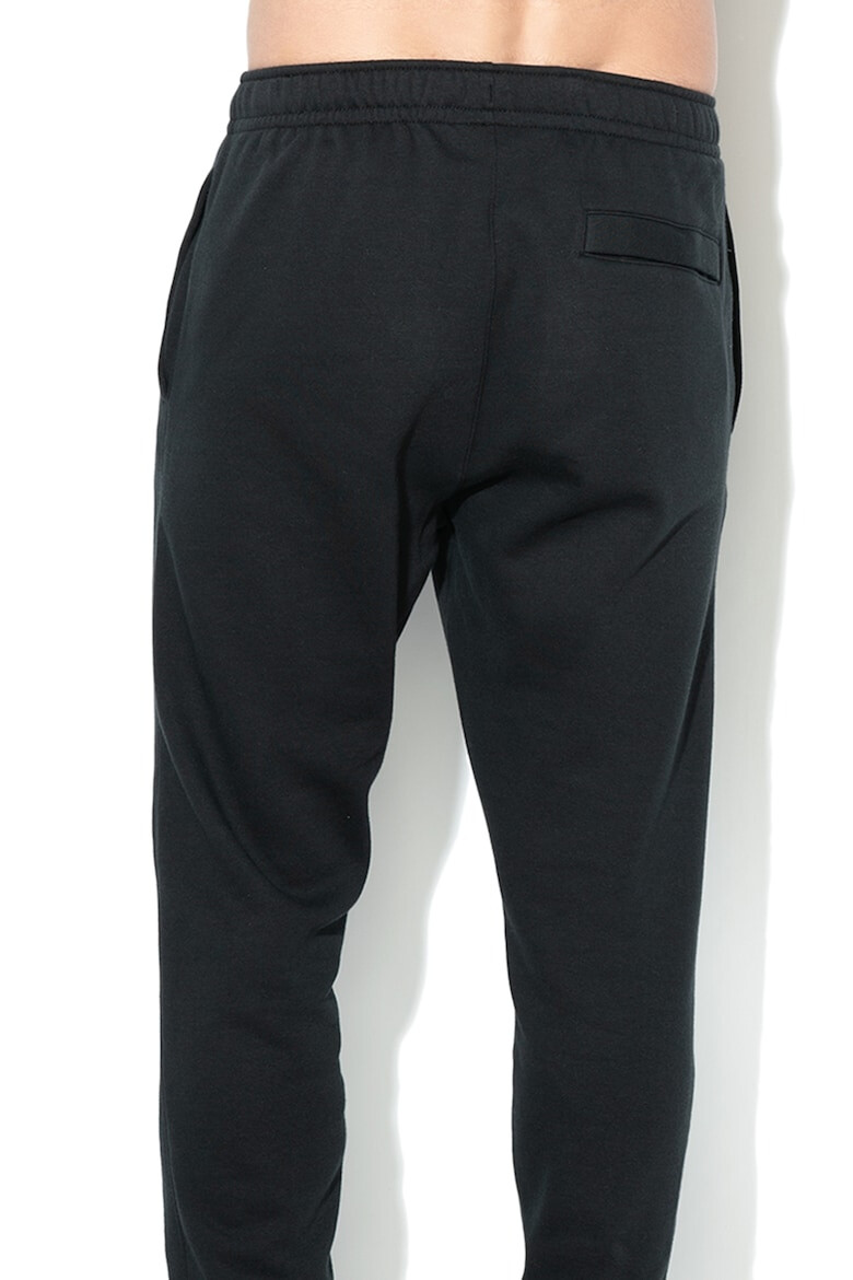 Nike Pantaloni de trening cu buzunare laterale - Pled.ro