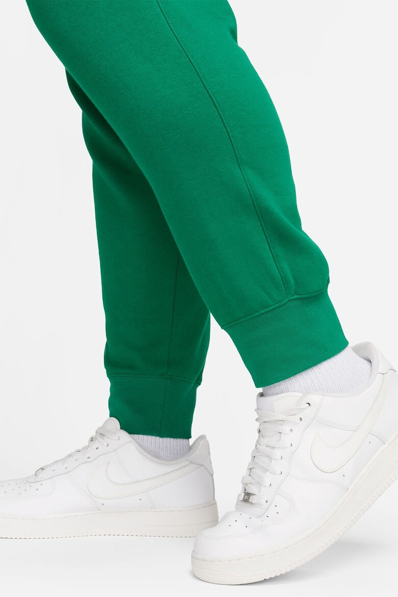 Nike Pantaloni de trening cu buzunare laterale - Pled.ro