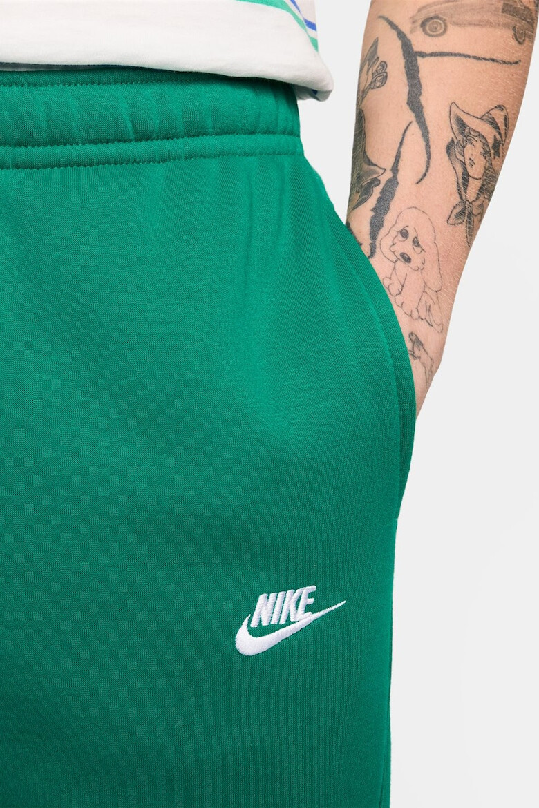 Nike Pantaloni de trening cu buzunare laterale - Pled.ro