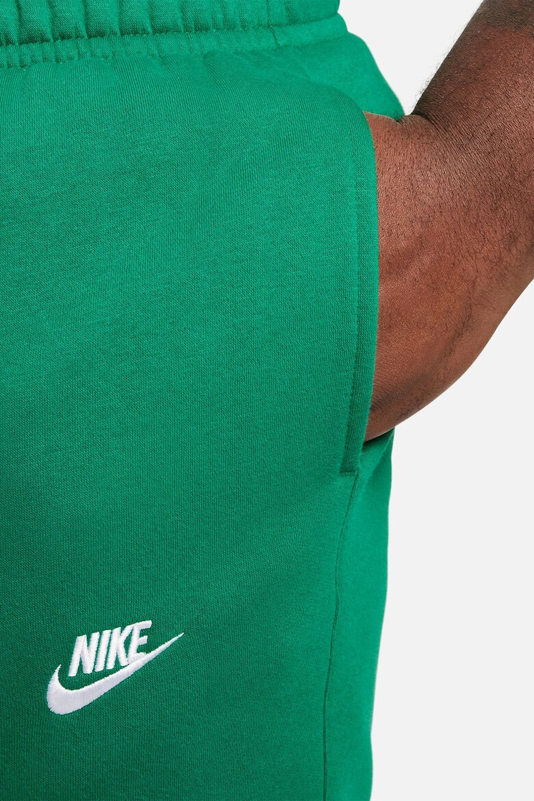 Nike Pantaloni de trening cu buzunare laterale - Pled.ro