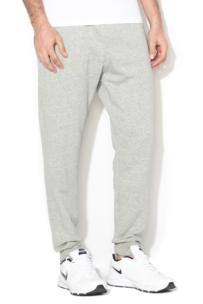 Nike Pantaloni de trening cu buzunare laterale - Pled.ro