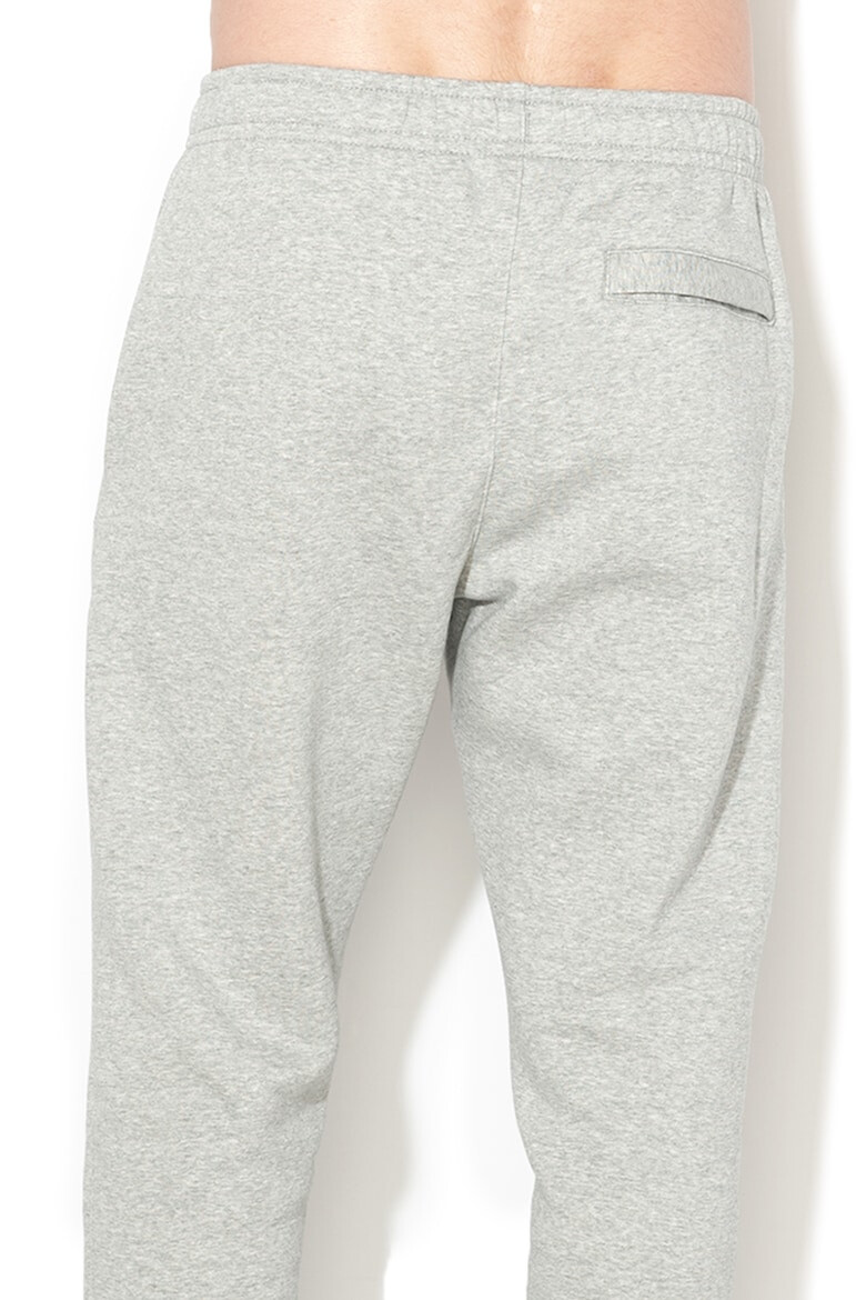 Nike Pantaloni de trening cu buzunare laterale - Pled.ro