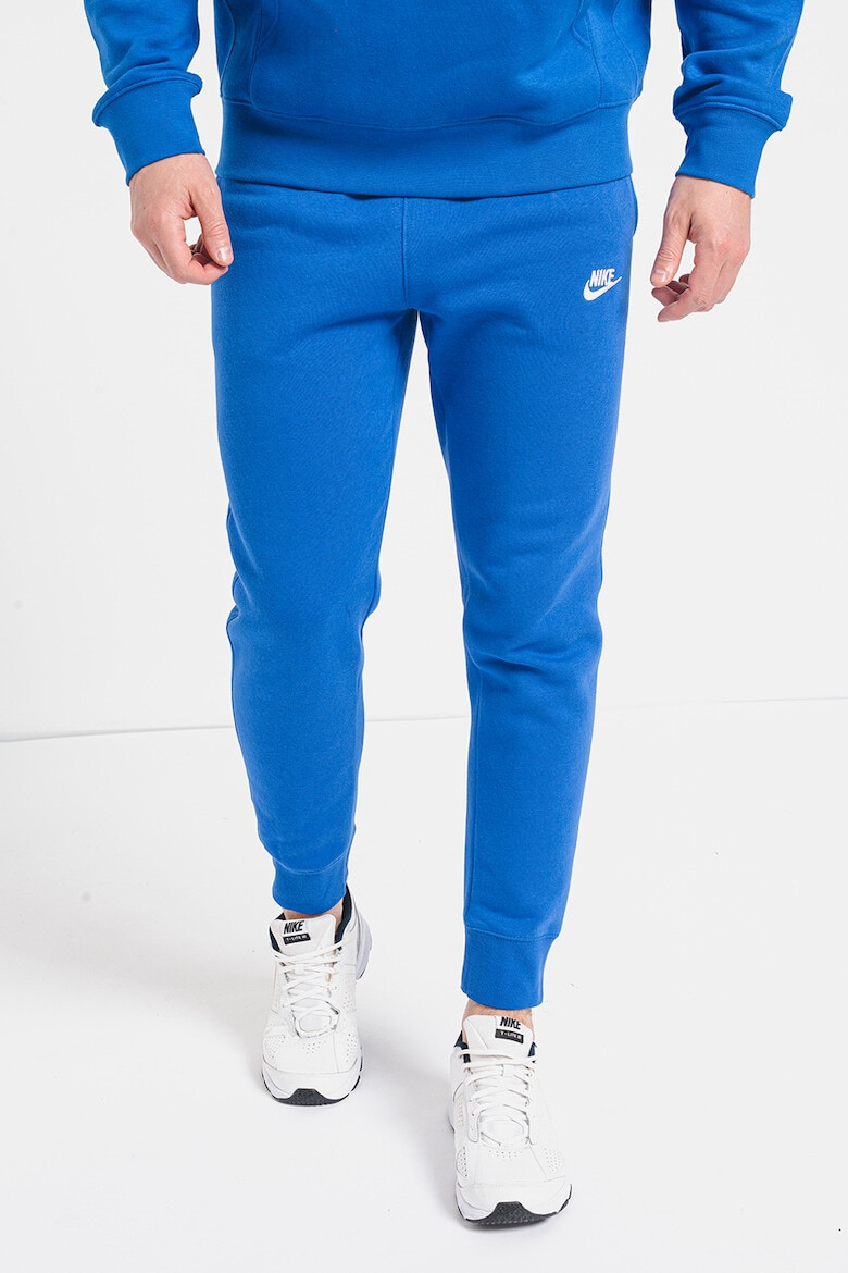 Nike Pantaloni de trening cu buzunare laterale - Pled.ro