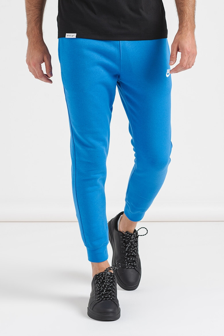 Nike Pantaloni de trening cu buzunare laterale - Pled.ro