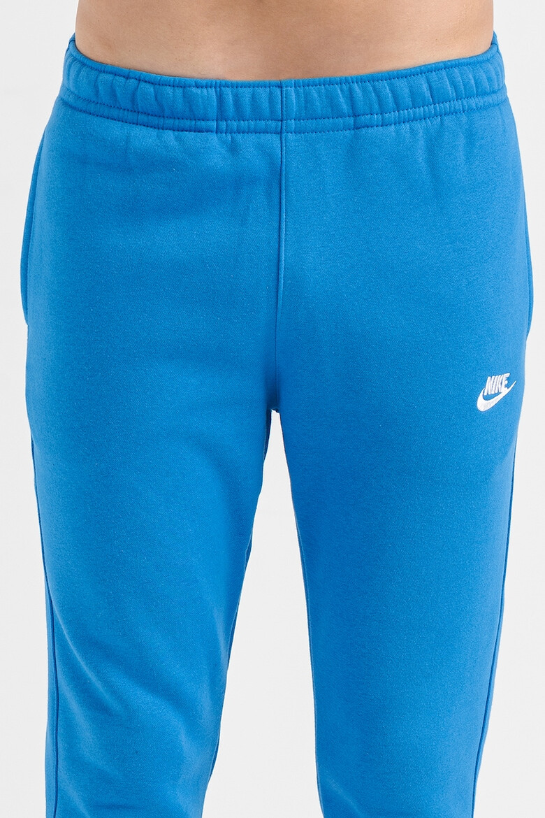 Nike Pantaloni de trening cu buzunare laterale - Pled.ro