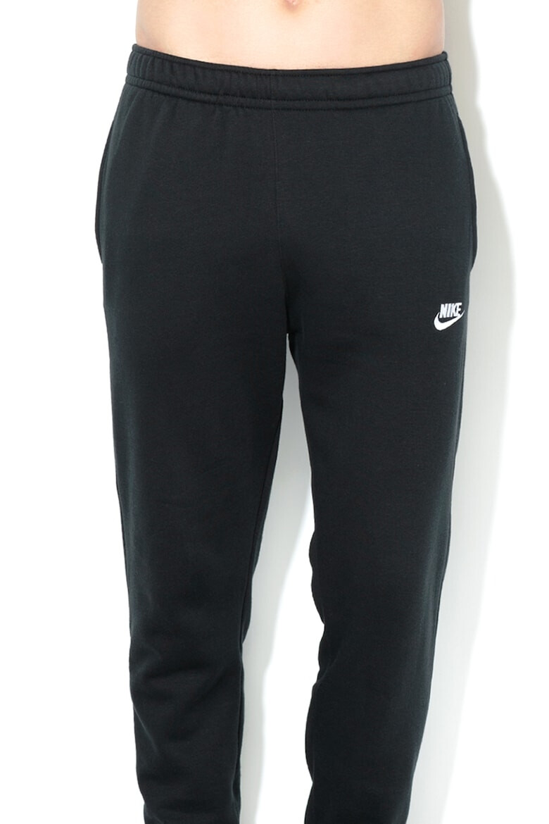 Nike Pantaloni de trening cu buzunare laterale - Pled.ro