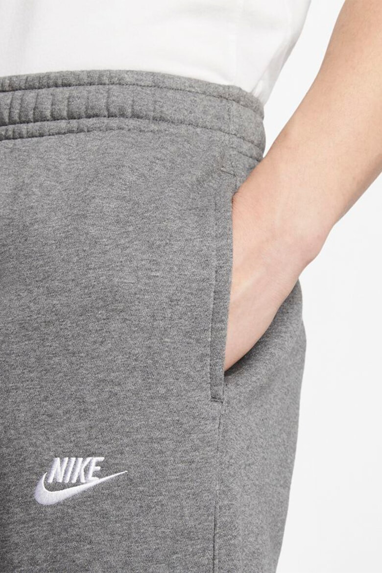 Nike Pantaloni de trening cu buzunare laterale - Pled.ro