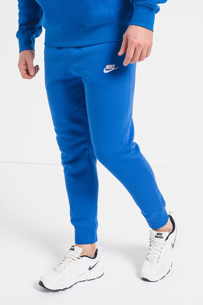 Nike Pantaloni de trening cu buzunare laterale - Pled.ro