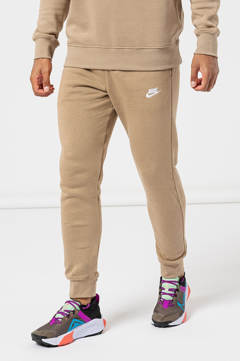 Nike Pantaloni de trening cu buzunare laterale - Pled.ro