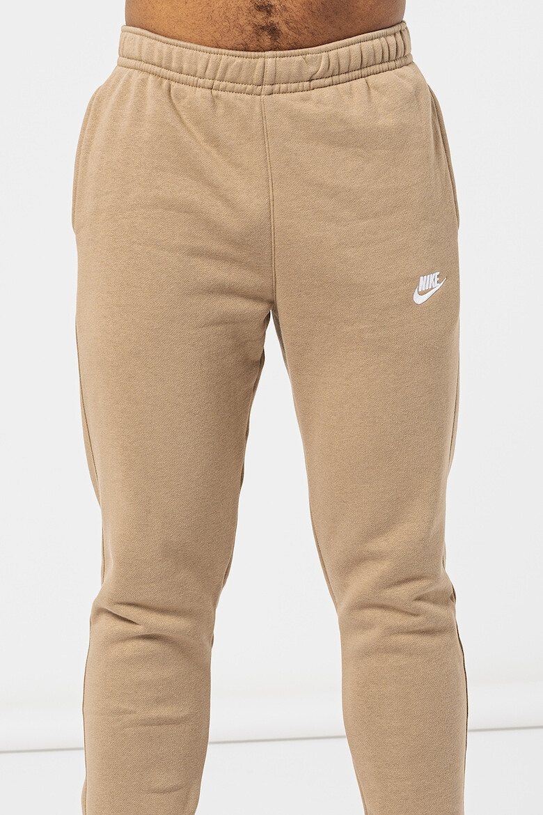 Nike Pantaloni de trening cu buzunare laterale - Pled.ro