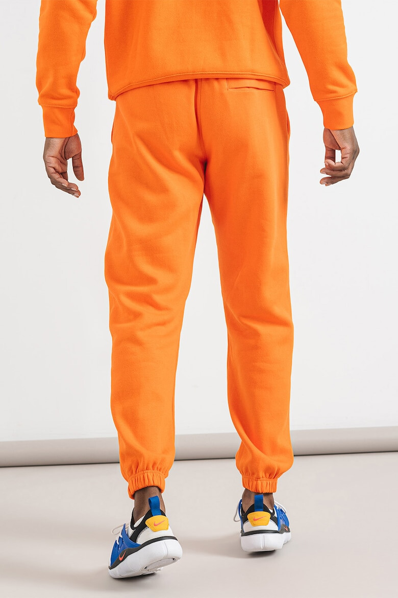 Nike Pantaloni de trening cu logo brodat - Pled.ro