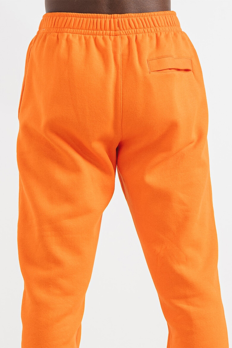 Nike Pantaloni de trening cu logo brodat - Pled.ro