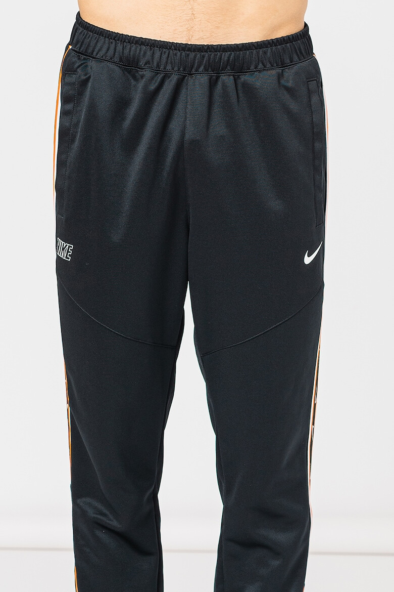 Nike Pantaloni de trening cu logo contrastant Repeat - Pled.ro