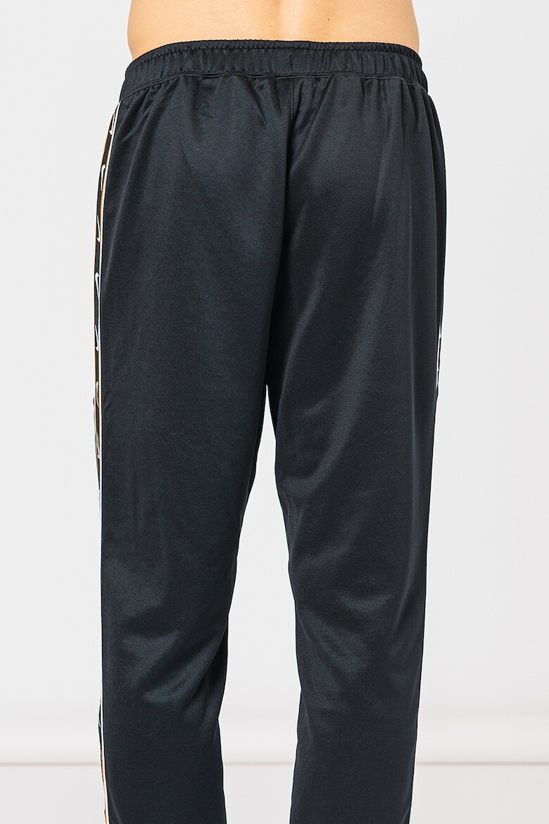 Nike Pantaloni de trening cu logo contrastant Repeat - Pled.ro