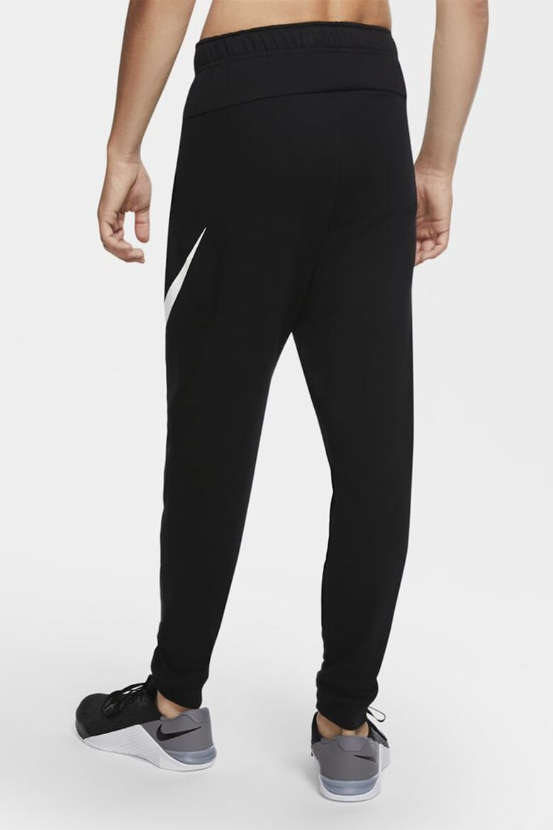 Nike Pantaloni de trening cu tehnologie Dri-Fit pentru fitness - Pled.ro