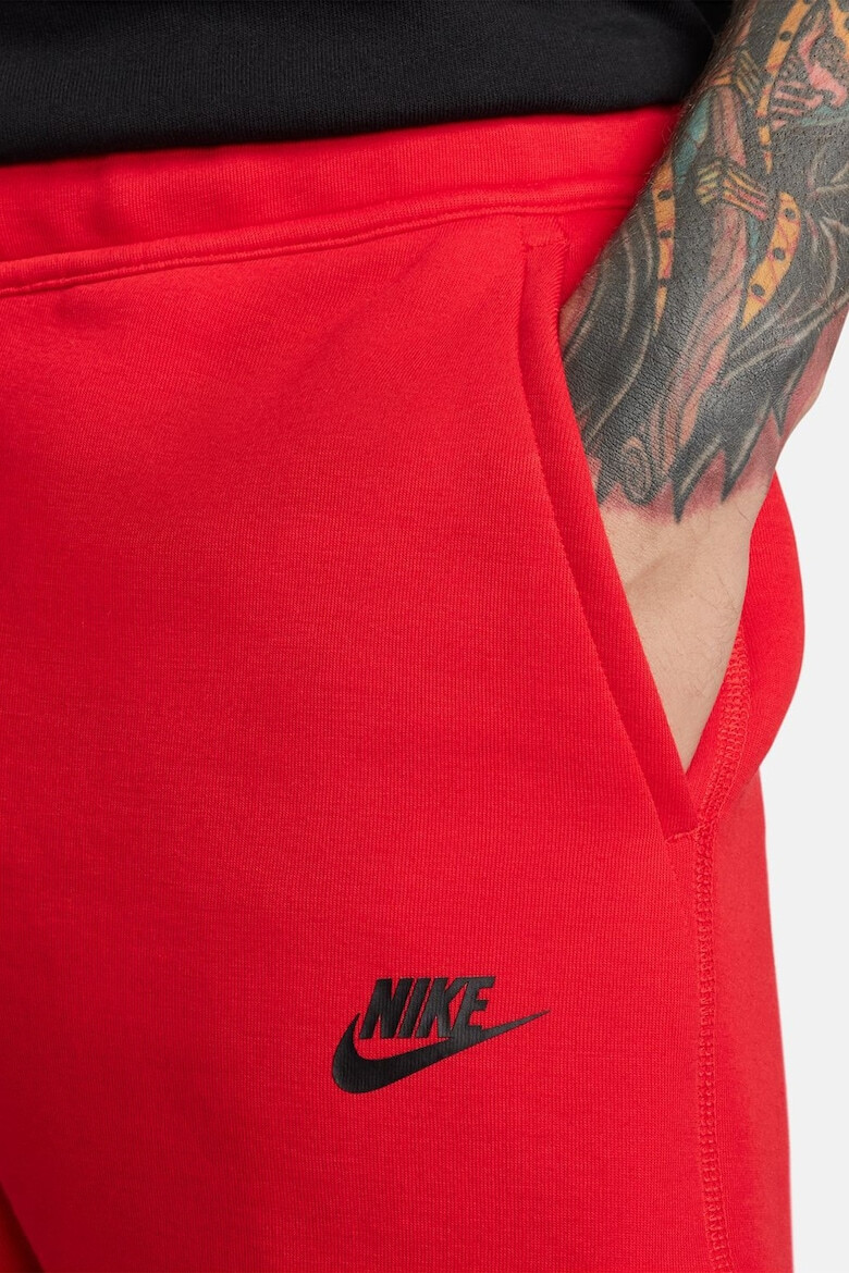 Nike Pantaloni de trening din amestec de bumbac cu logo Tech - Pled.ro