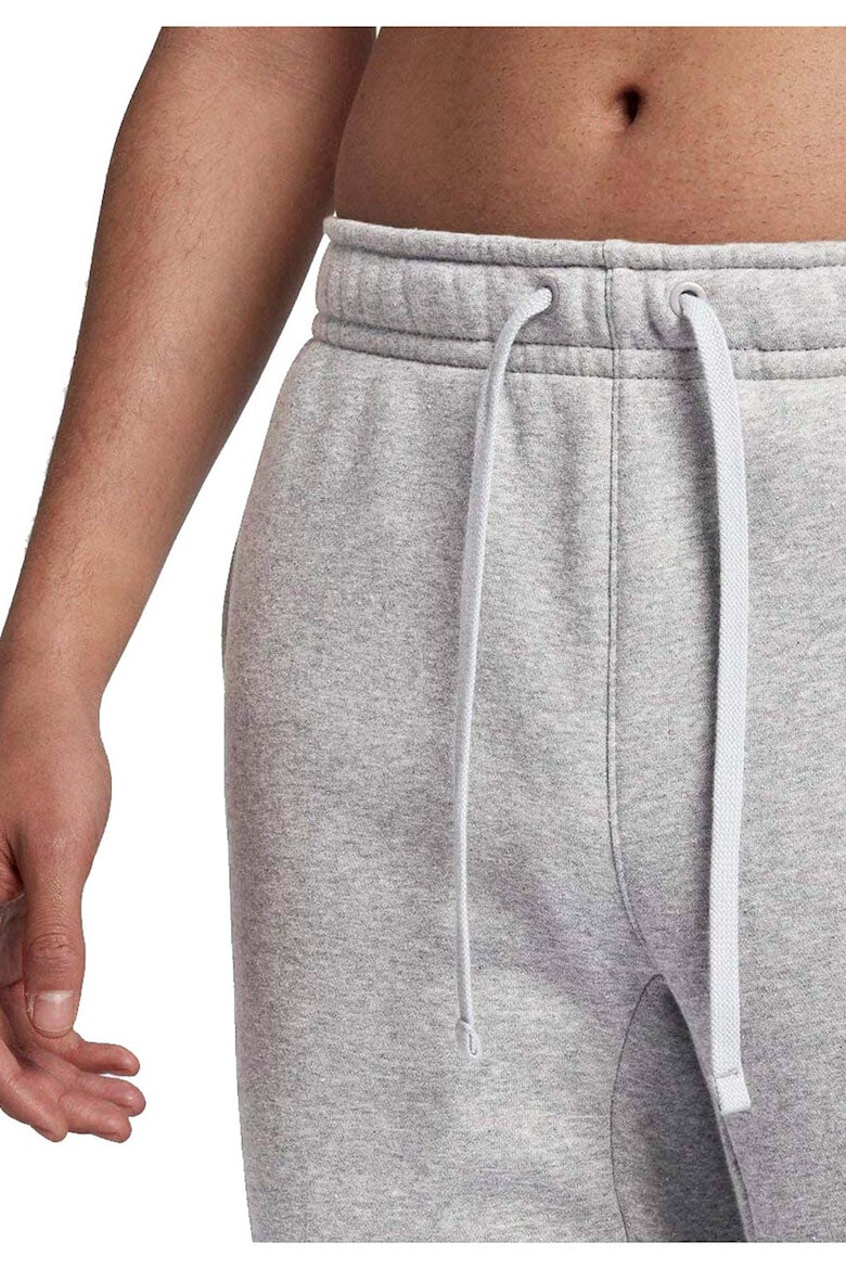 Nike Pantaloni de trening din amestec de bumbac cu talie medie - Pled.ro