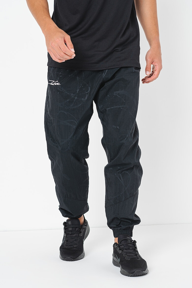 Nike Pantaloni de trening FUTURA Windrunner Breaking - Pled.ro